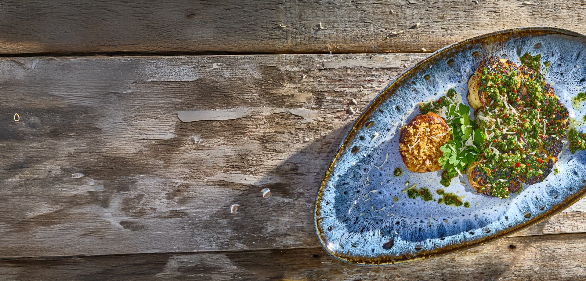 Cauliflower Steak with gratin & salsa verde